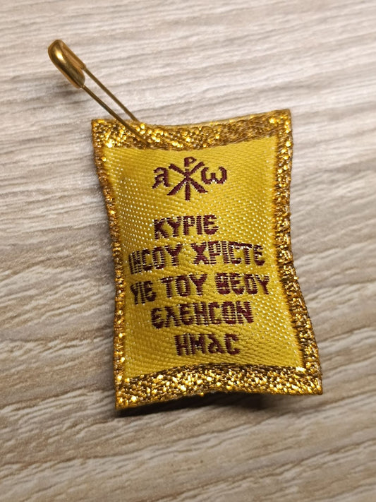 Amulett des Jesus Christus mit Sicherheitsnadel