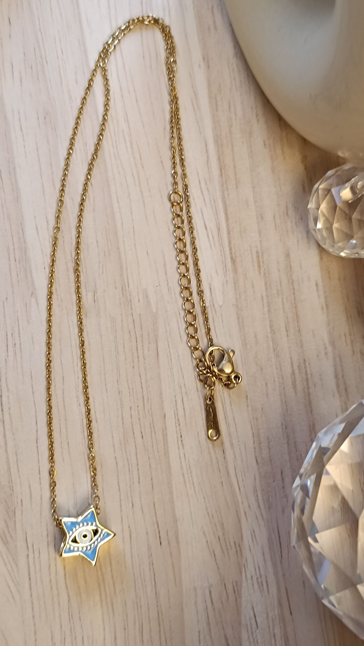 Auge mit Edelstahlkette, verschiedene Farben