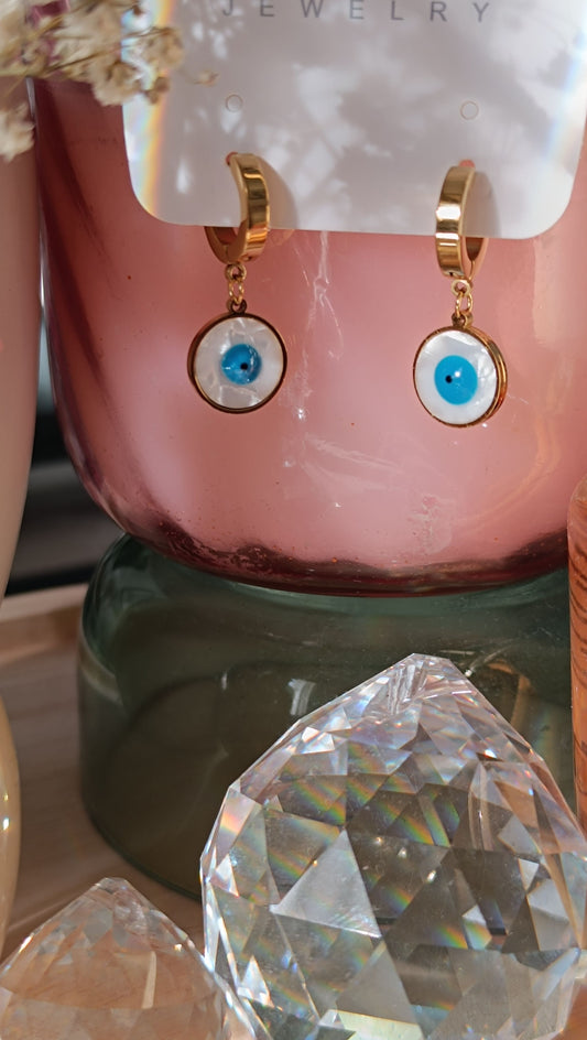 Ohrringe aus Goldstahl, rundes blaues Auge