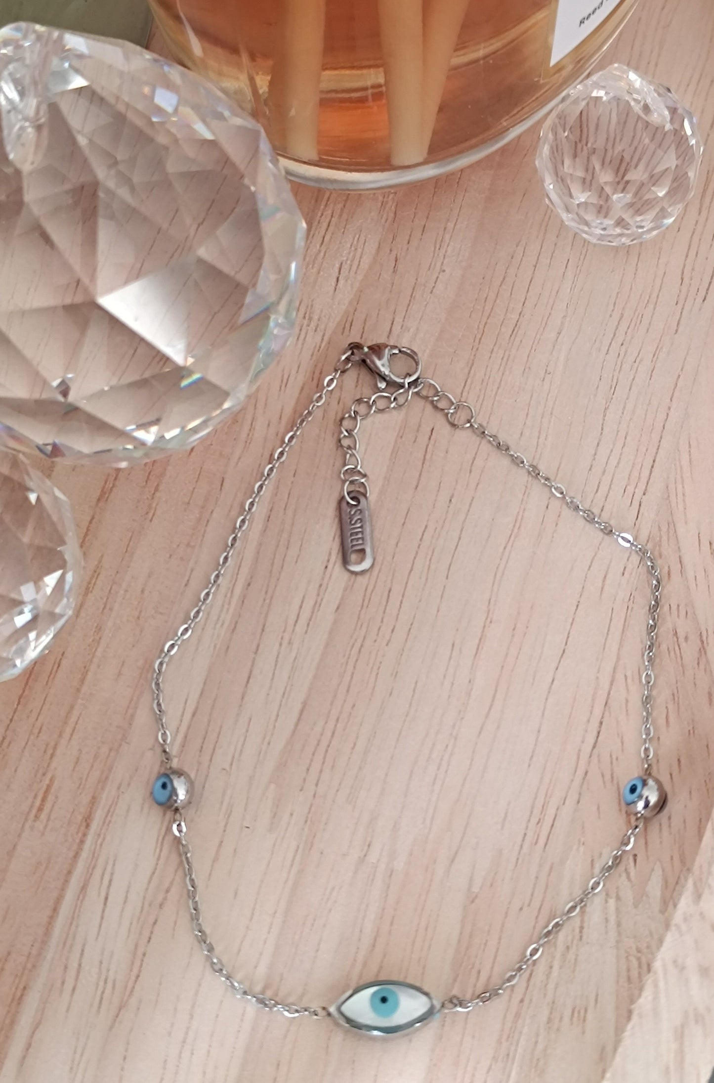 Silbernes Edelstahlarmband mit blauen Augen