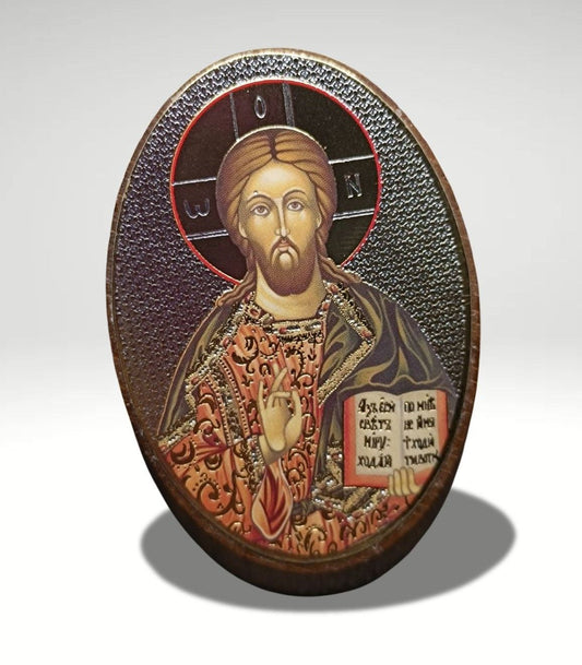 Holzbild von Christus mit Aufkleber