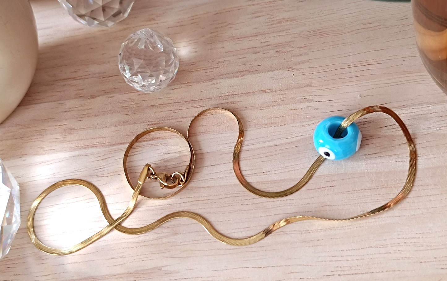 Glasauge mit Edelstahlkette