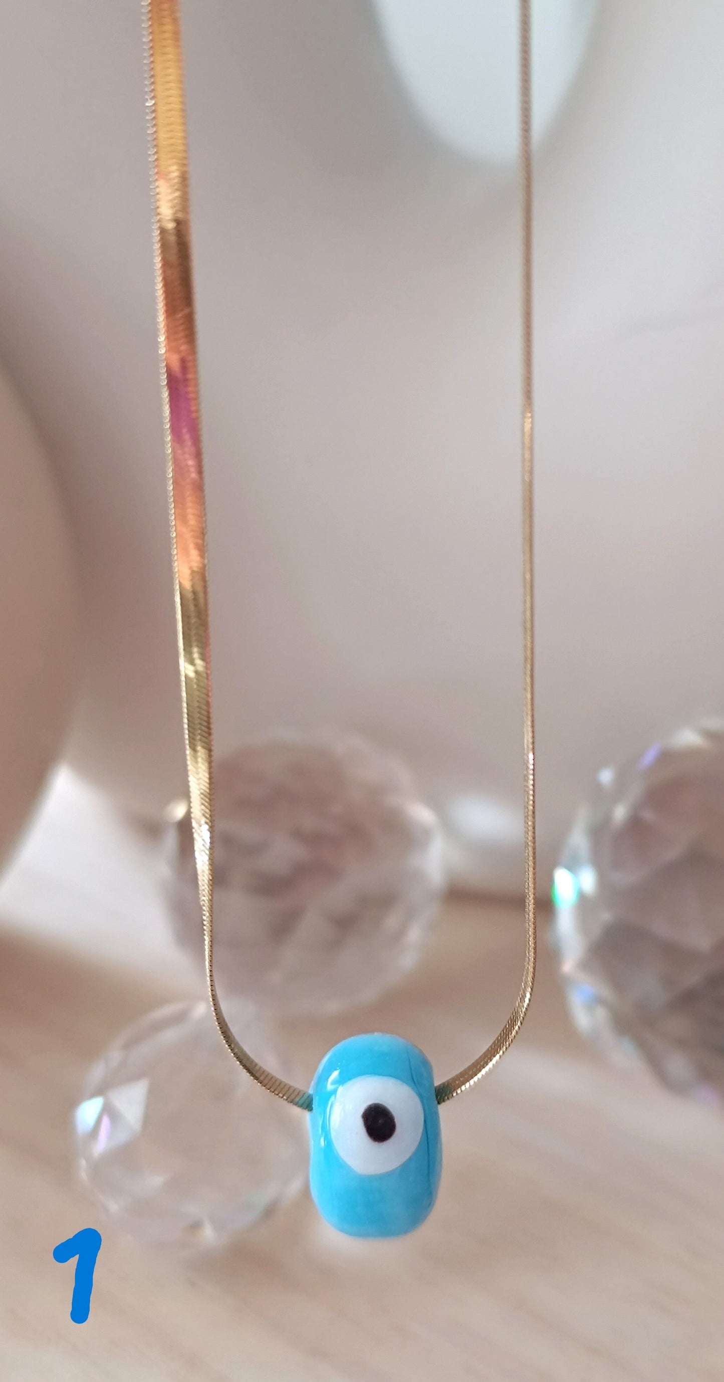 Glasauge mit Edelstahlkette